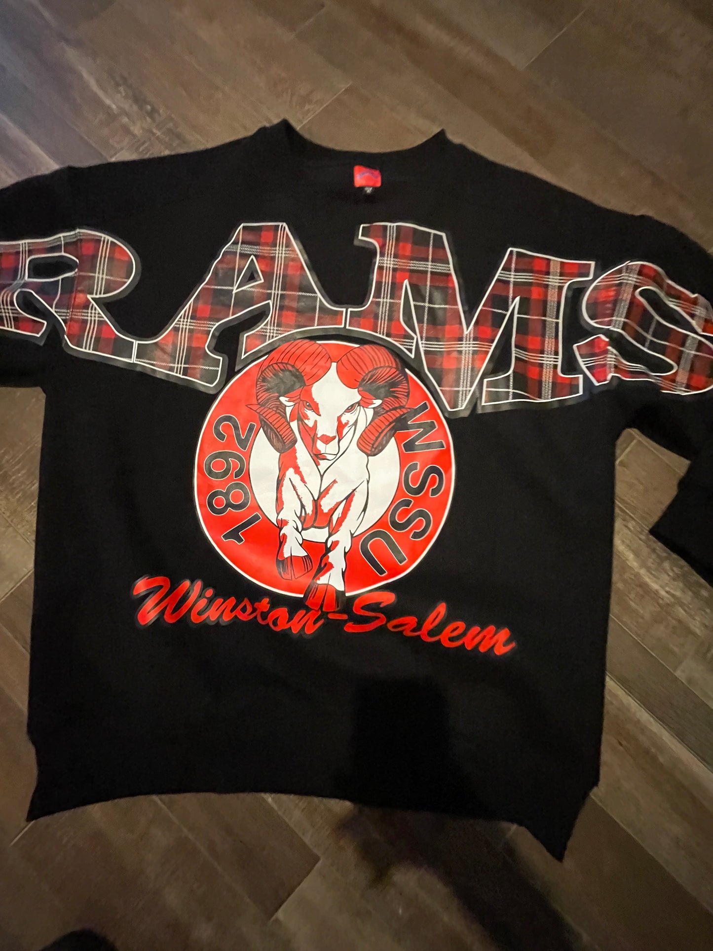 Black Rams Plaid crewneck