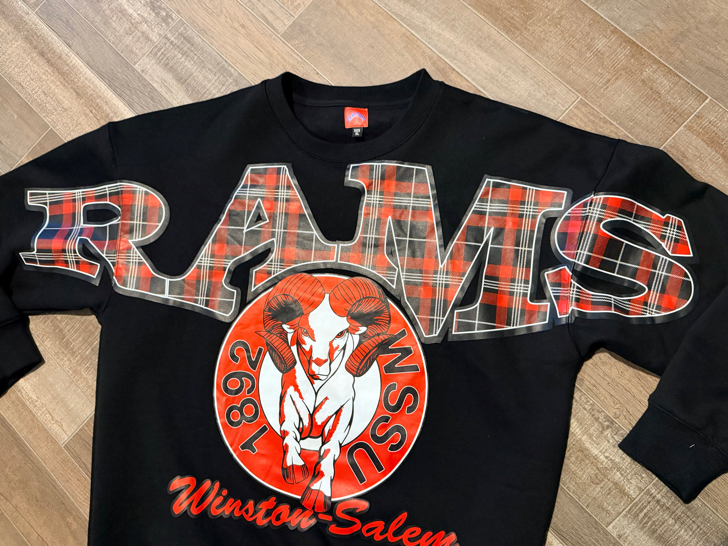 Black Rams Plaid crewneck